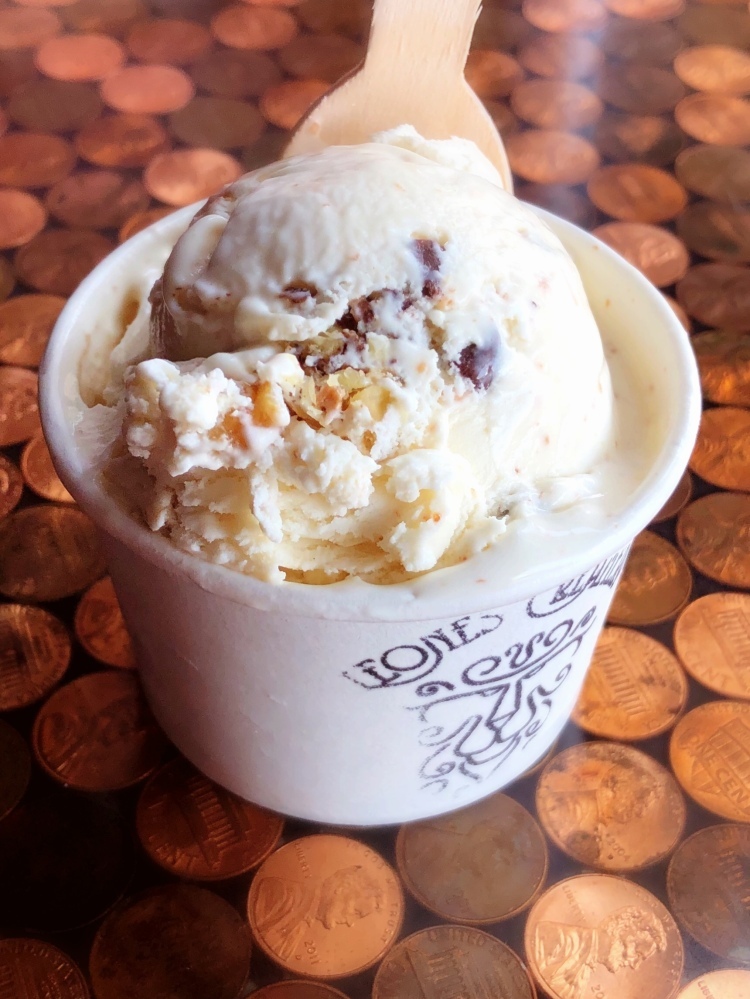 Creamy graham cracker ice cream, chock-full of semi-sweet and white chocolate chips, toasted coconut, and sweetened condensed milk candied walnuts!