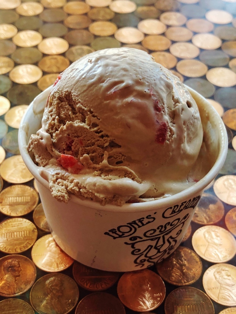 Cola ice cream with chopped maraschino cherries riddled throughout!