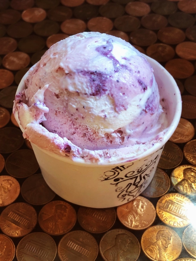 Our Sweet Cream and Red Raspberry ice creams, folded together with housemade blueberry jam. Only available around the 4th of July!