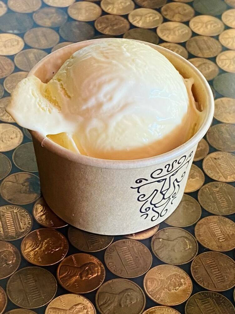 Sweet, creamy, mango ice cream! Made with heaps of fresh mango purée and a teeny hint of lime.