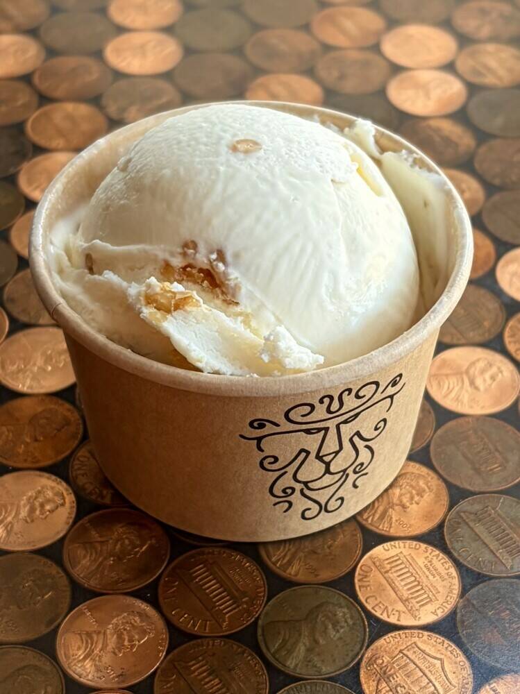 A sweet and subtle mascarpone ice cream with a honey swirl and honey-candied pine nuts.