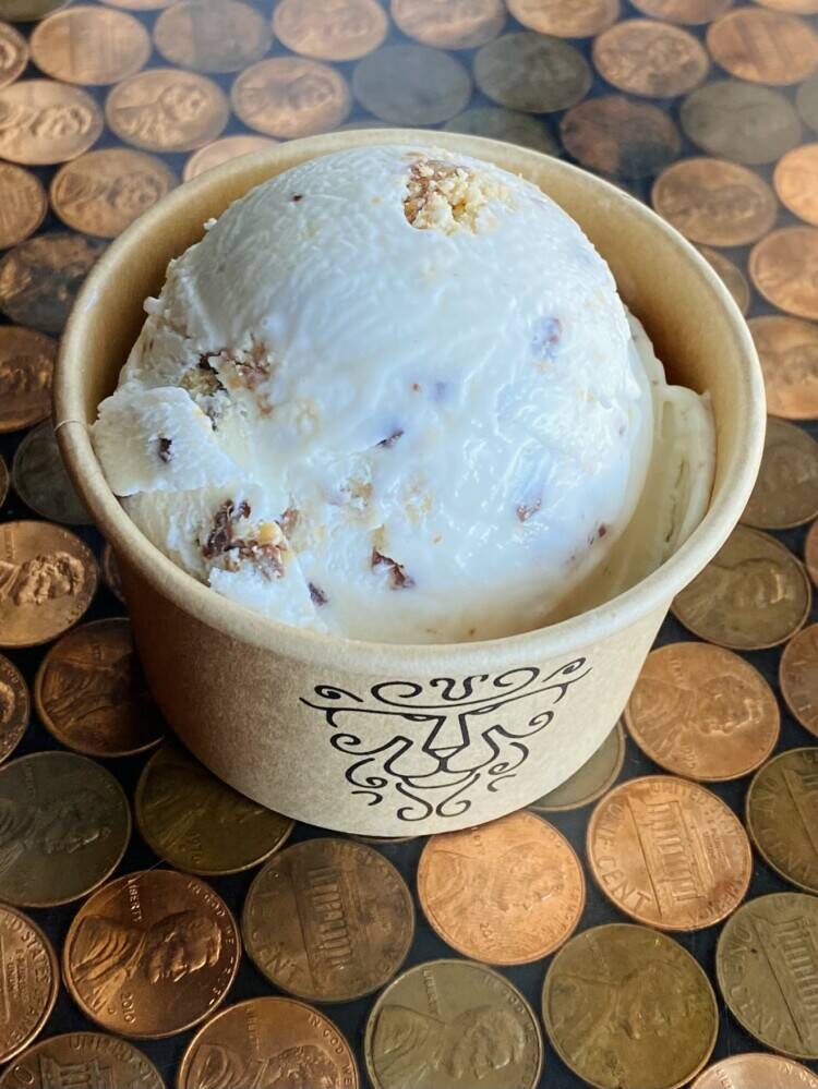 Our Twix Peanut Butter Cup Ice Cream is a knockout! Sweet Cream, peanut butter cups, Twix bars-- it's creamy, crunchy, and everything you need!