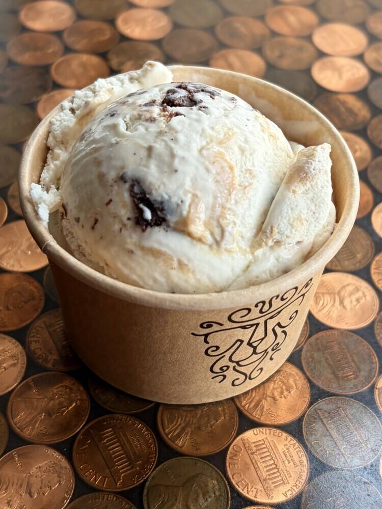 Sweet Cream ice cream with pieces of our chewy brownies and a ribbon of espresso caramel!