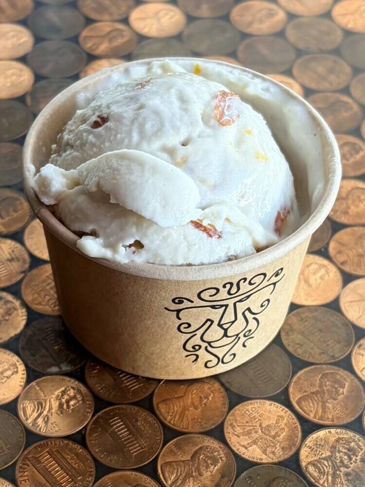 Vegan, coconut milk ice cream with toasted almonds and a swirl of housemade orange marmalade.