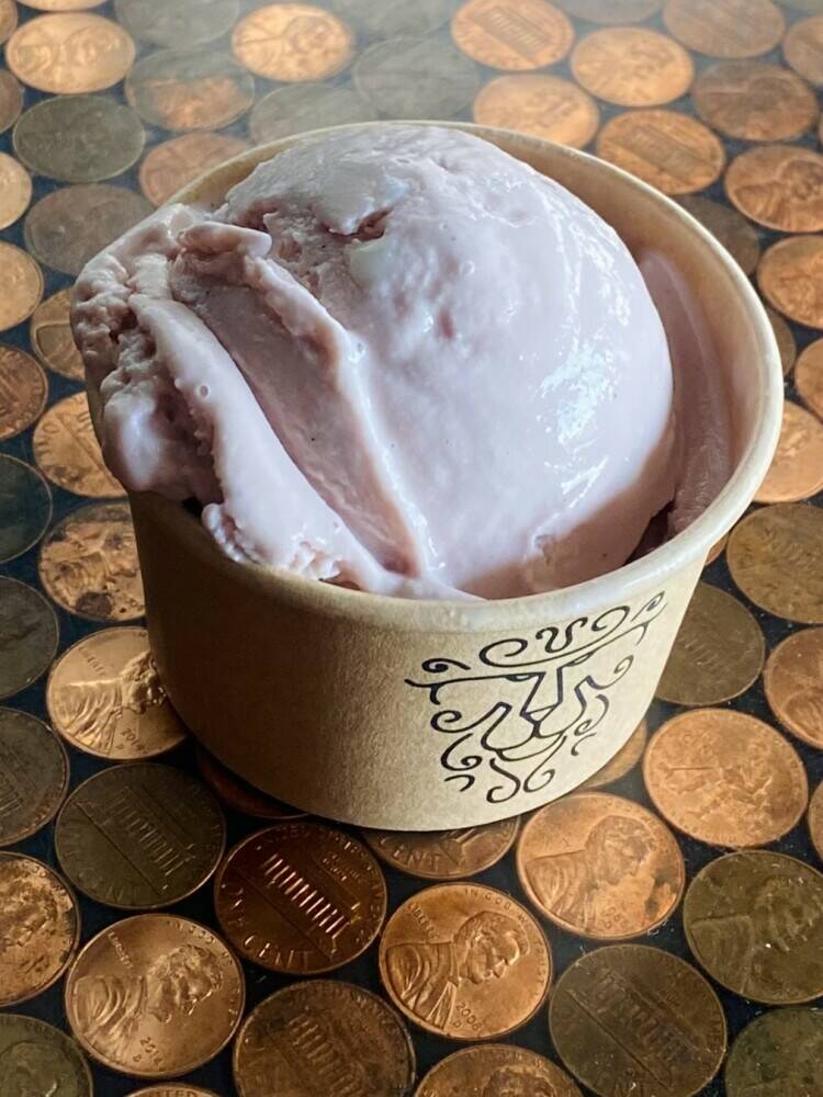 Vegan and coconut-milk based! Sweet and creamy strawberry ice cream with mini vegan white chocolate chips.