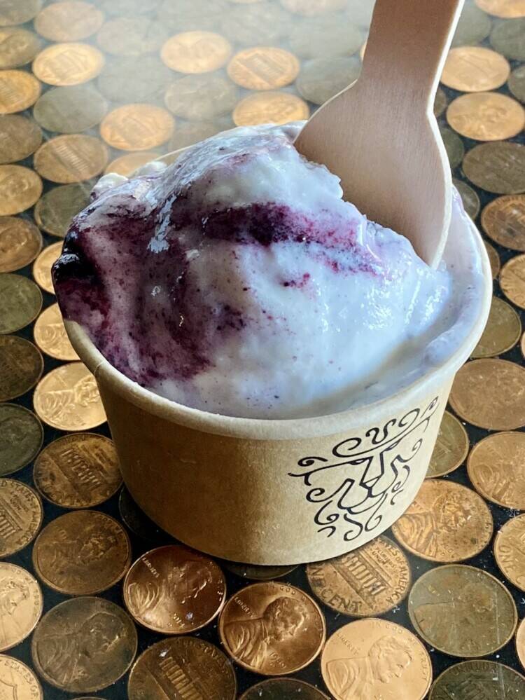 Vegan coconut ice cream with a ribbon of our housemade blueberry jam.